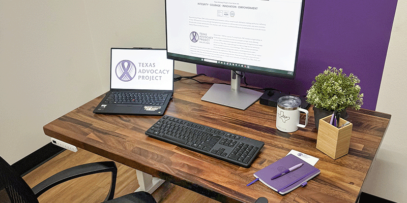 Texas Advocacy Project workspace equipped with UPLIFT Desk ergonomic furniture.